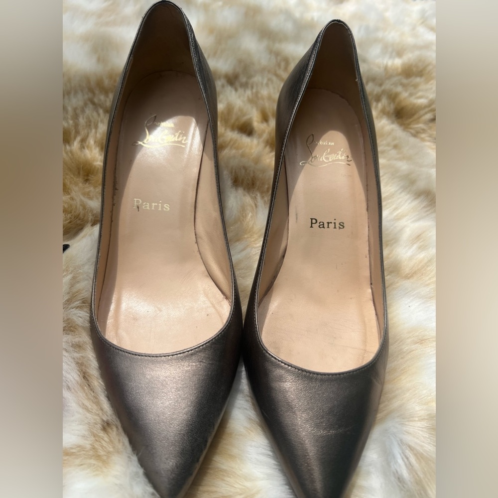 Gorgeous AUTHENTIC Christian Louboutin low heels. Color is a beautiful pewter.